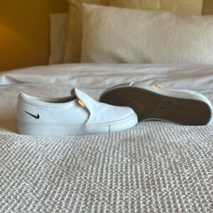 Nike White Slip-On Sneakers